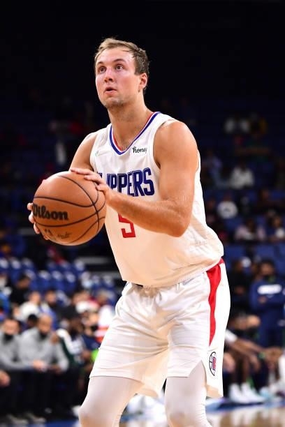 Luke Kennard of the LA Clippers shoots a free throw during a preseason game against the Minnesota Timberwolves on October 11, 2021 at Toyota Arena in...