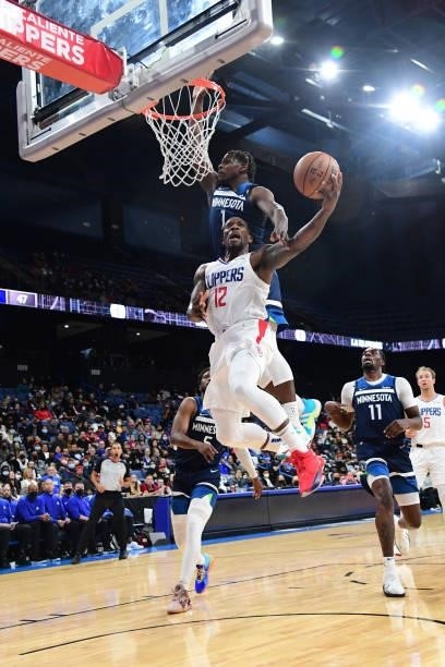 Eric Bledsoe of the LA Clippers drives to the basket during a preseason game against the Minnesota Timberwolves on October 11, 2021 at Toyota Arena...