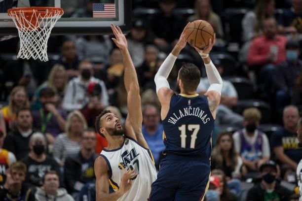 Jonas Valanciunas of the New Orleans Pelicans shoots over Rudy Gobert of the Utah Jazz during the first half of their game on October 11, 2021 at the...