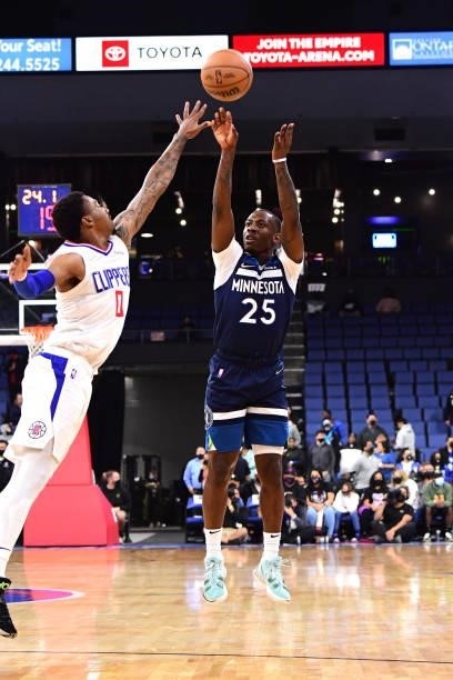 McKinley Wright IV of the Minnesota Timberwolves shoots a three point basket during a preseason game against the LA Clippers on October 11, 2021 at...
