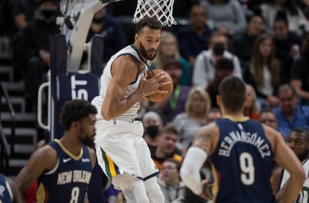 Rudy Gobert of the Utah Jazz grabs a rebound during the first half of their game against the New Orleans Pelicans on October 11, 2021 at the Vivint...