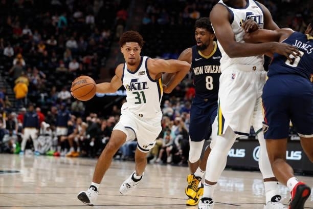 MaCio Teague of the Utah Jazz drives to the basket against the New Orleans Pelicans during a preseason game on October 11, 2021 at vivint.SmartHome...