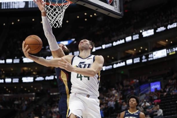Bojan Bogdanovic of the Utah Jazz shoots the ball against the New Orleans Pelicans during a preseason game on October 11, 2021 at vivint.SmartHome...