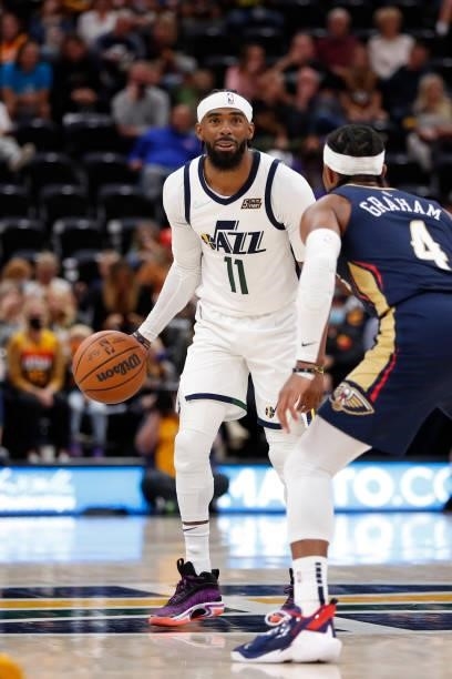 Mike Conley of the Utah Jazz handles the ball against the New Orleans Pelicans during a preseason game on October 11, 2021 at vivint.SmartHome Arena...