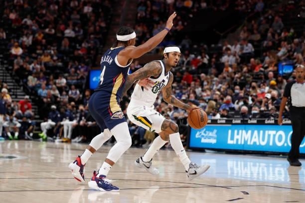 Jordan Clarkson of the Utah Jazz drives to the basket against the New Orleans Pelicans during a preseason game on October 11, 2021 at...