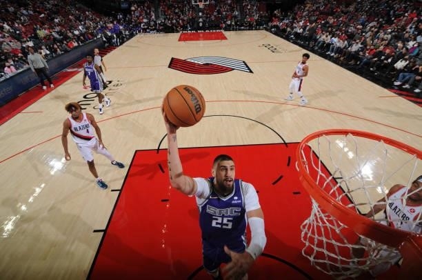 Alex Len of the Sacramento Kings shoots the ball during a preseason game against the Portland Trail Blazers on October 11, 2021 at the Moda Center...