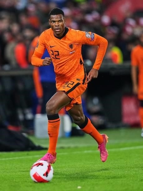 Denzel Dumfries of Holland detached at the ball during the World Cup qualifier match between the Netherlands and Gibraltar at Feyenoord Stadium de...