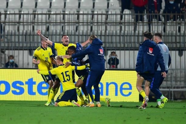 Tim Prica of Sweden celebrates after scoring his team's first goal with teammates during the 2022 UEFA European Under-21 Championship Qualifier match...