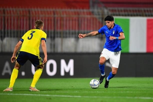 Raul Bellanova of Italy controls the ball during the 2022 UEFA European Under-21 Championship Qualifier match between Italy and Sweden at Stadio...