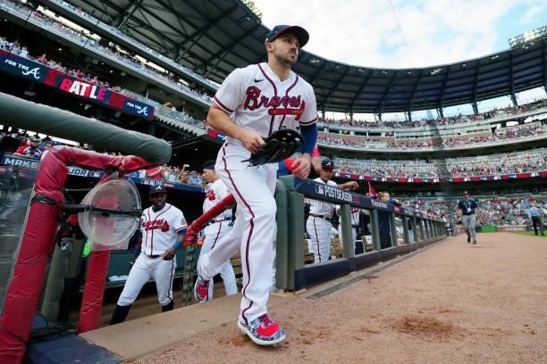 Adam Duvall of the Atlanta Braves takes the field prior to Game 4 of the NLDS between the Milwaukee Brewers and the Atlanta Braves at Truist Park on...