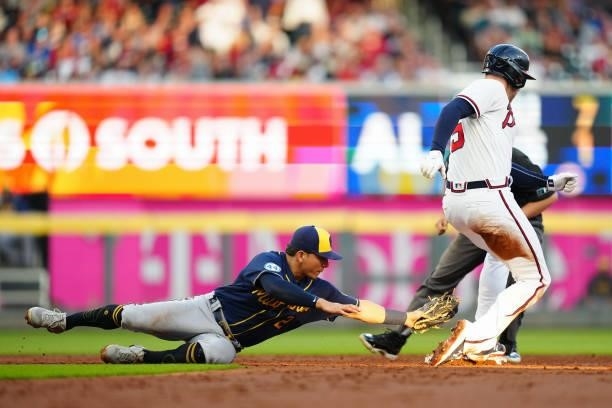 Freddie Freeman of the Atlanta Braves is safe at second base after hitting a double in the bottom of the third inning during Game 4 of the NLDS...