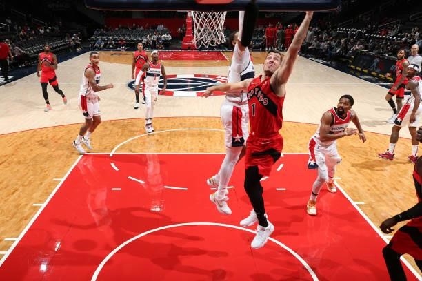 Goran Dragic of the Toronto Raptors drives to the basket during a preseason game against the Washington Wizards on October 12, 2021 at Capital One...