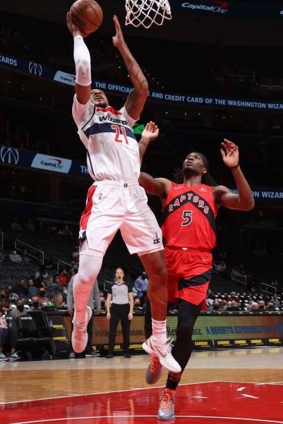 Daniel Gafford of the Washington Wizards drives to the basket during a preseason game against the Toronto Raptors on October 12, 2021 at Capital One...