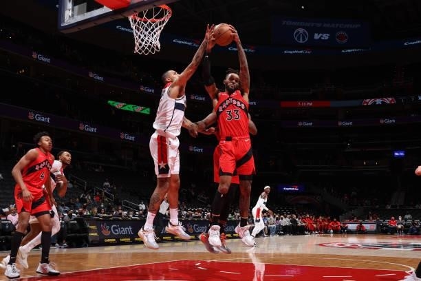 Gary Trent Jr. #33 of the Toronto Raptors rebounds the ball during a preseason game against the Washington Wizards on October 12, 2021 at Capital One...