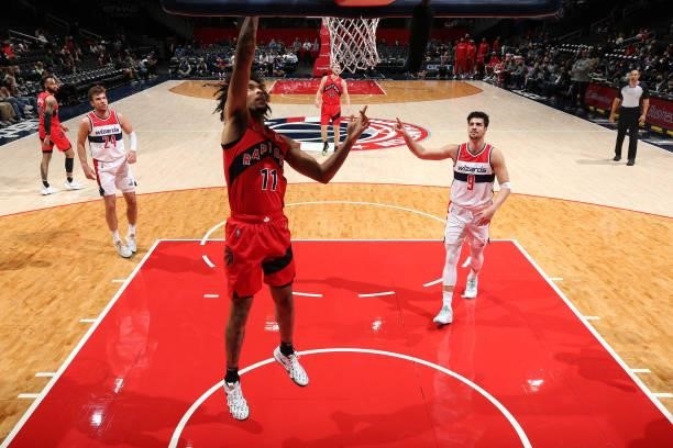 Justin Champagnie of the Toronto Raptors drives to the basket during a preseason game against the Washington Wizards on October 12, 2021 at Capital...