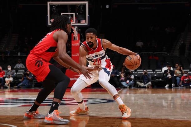 Spencer Dinwiddie of the Washington Wizards dribbles the ball during a preseason game against the Toronto Raptors on October 12, 2021 at Capital One...