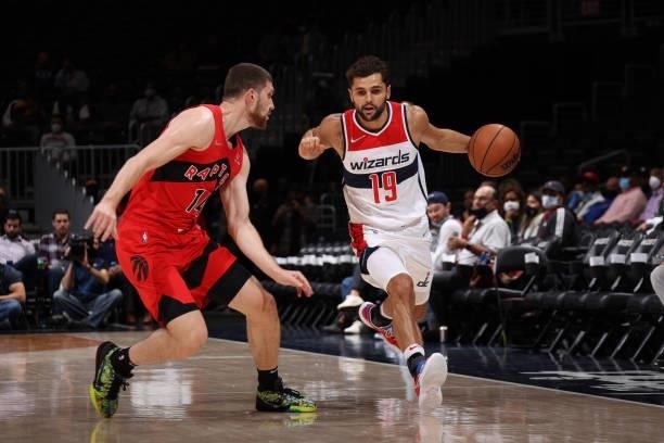Raul Neto of the Washington Wizards dribbles the ball during a preseason game against the Toronto Raptors on October 12, 2021 at Capital One Arena in...