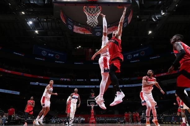 Goran Dragic of the Toronto Raptors drives to the basket during a preseason game against the Washington Wizards on October 12, 2021 at Capital One...