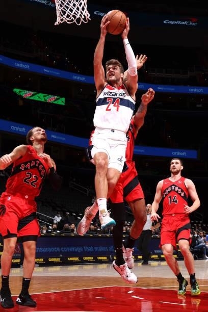 Corey Kispert of the Washington Wizards dunks the ball during a preseason game against the Toronto Raptors on October 12, 2021 at Capital One Arena...