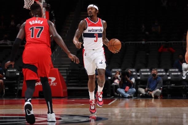 Bradley Beal of the Washington Wizards dribbles the ball during a preseason game against the Toronto Raptors on October 12, 2021 at Capital One Arena...