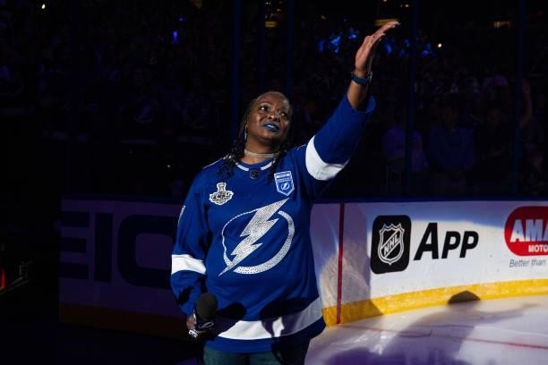 TSgt Sonya Bryson, US Air Force acknowledges fans before singing the National Anthem before the game between the Tampa Bay Lightning against the...
