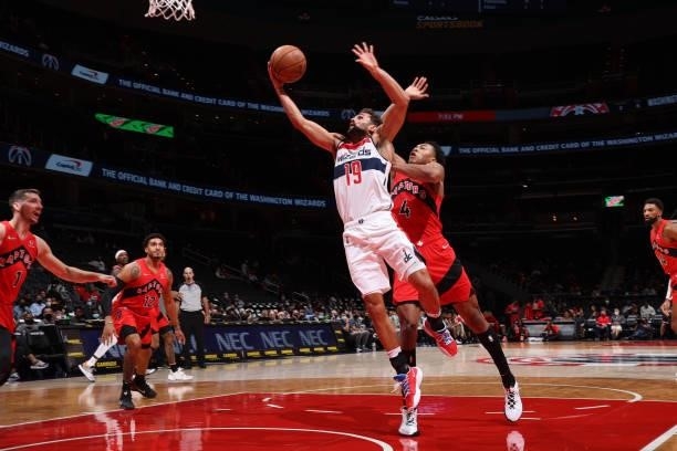 Raul Neto of the Washington Wizards drives to the basket during a preseason game against the Toronto Raptors on October 12, 2021 at Capital One Arena...