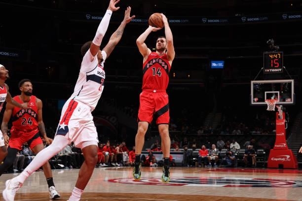Svi Mykhailiuk of the Toronto Raptors shoots the ball during a preseason game against the Washington Wizards on October 12, 2021 at Capital One Arena...