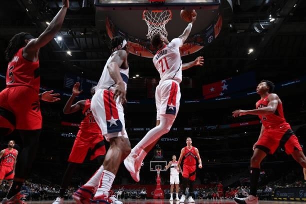 Daniel Gafford of the Washington Wizards drives to the basket during a preseason game against the Toronto Raptors on October 12, 2021 at Capital One...