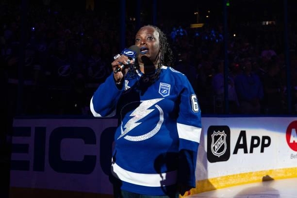 TSgt Sonya Bryson, US Air Force sings the national anthem before the game between the Tampa Bay Lightning against the Pittsburgh Penguins at Amalie...
