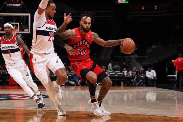 Gary Trent Jr. #33 of the Toronto Raptors dribbles the ball during a preseason game against the Washington Wizards on October 12, 2021 at Capital One...