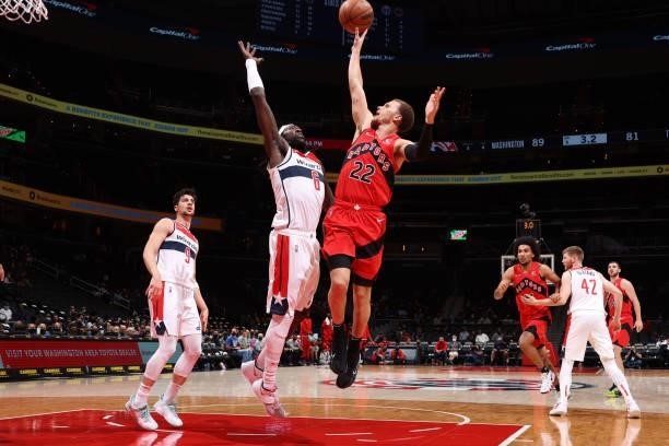 Malachi Flynn of the Toronto Raptors shoots the ball during a preseason game against the Washington Wizards on October 12, 2021 at Capital One Arena...
