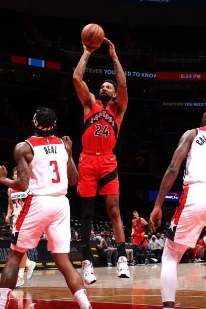 Khem Birch of the Toronto Raptors shoots the ball during a preseason game against the Washington Wizards on October 12, 2021 at Capital One Arena in...