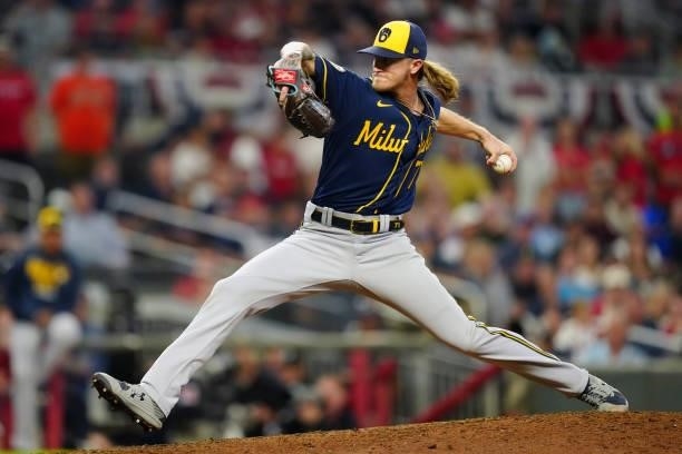 Josh Hader of the Milwaukee Brewers pitches in the bottom of the eighth inning during Game 4 of the NLDS between the Milwaukee Brewers and the...