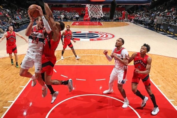 Corey Kispert of the Washington Wizards drives to the basket during a preseason game against the Toronto Raptors on October 12, 2021 at Capital One...