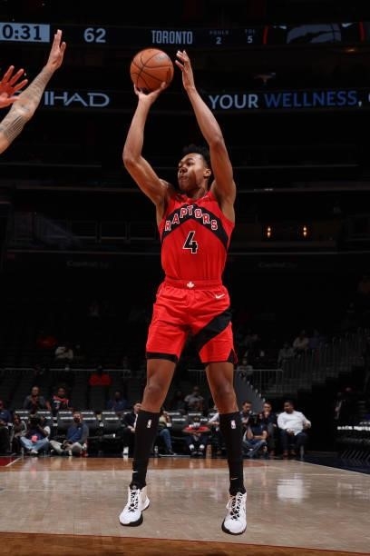 Scottie Barnes of the Toronto Raptors shoots a three point basket during a preseason game against the Washington Wizards on October 12, 2021 at...