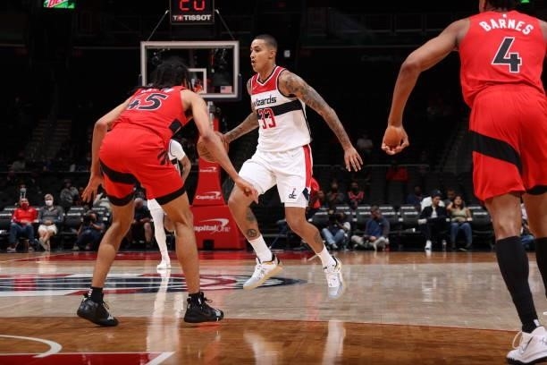 Kyle Kuzma of the Washington Wizards dribbles the ball during a preseason game against the Toronto Raptors on October 12, 2021 at Capital One Arena...