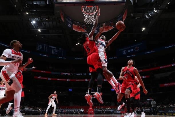 Bradley Beal of the Washington Wizards drives to the basket during a preseason game against the Toronto Raptors on October 12, 2021 at Capital One...