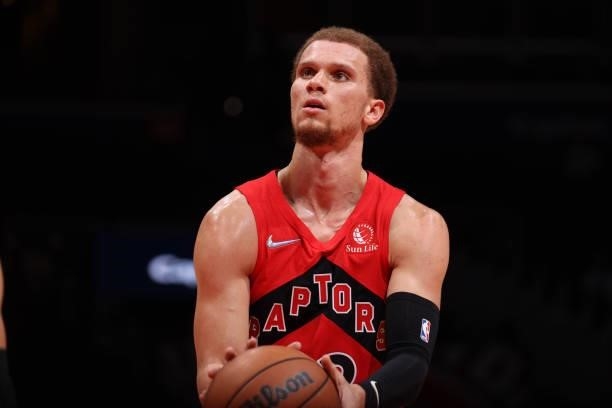 Malachi Flynn of the Toronto Raptors shoots a free throw during a preseason game against the Washington Wizards on October 12, 2021 at Capital One...