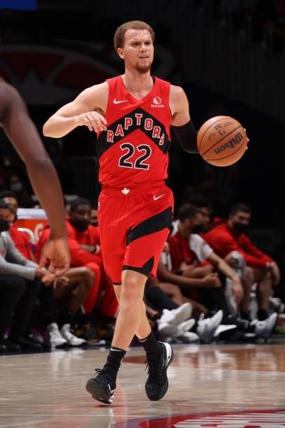Malachi Flynn of the Toronto Raptors dribbles the ball during a preseason game against the Washington Wizards on October 12, 2021 at Capital One...