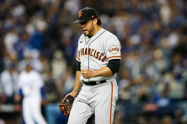 Jose Alvarez of the San Francisco Giants reacts after strikeout in the second inning during Game 4 of the NLDS between the San Francisco Giants and...