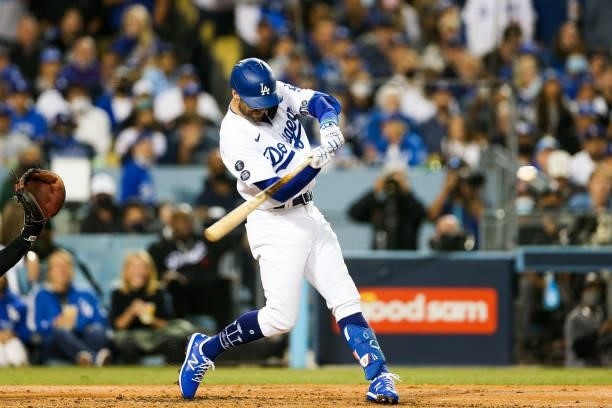 Chris Taylor of the Los Angeles Dodgers hits a RBI sac fly in the second inning during Game 4 of the NLDS between the San Francisco Giants and the...