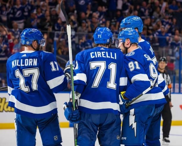 Alex Killorn, Victor Hedman, and Steven Stamkos of the Tampa Bay Lightning celebrate a goal by Anthony Cirelli against the Pittsburgh Penguins during...