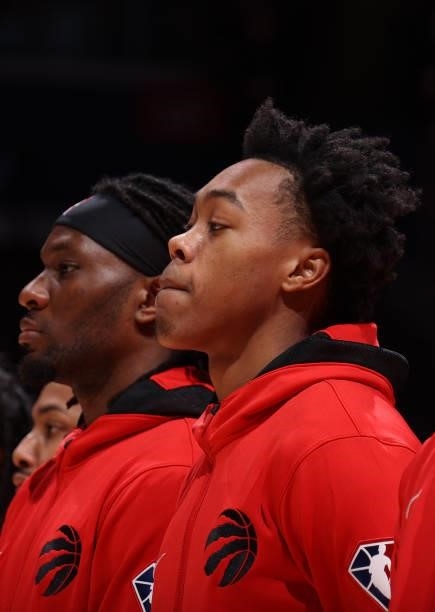 Scottie Barnes of the Toronto Raptors looks on before the preseason game against the Washington Wizards on October 12, 2021 at Capital One Arena in...