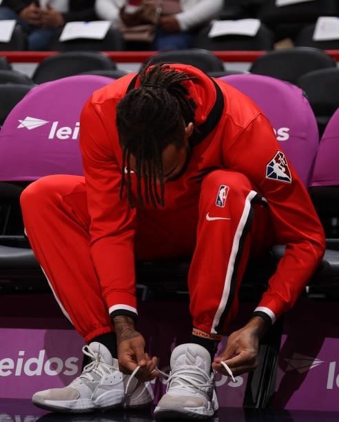 Gary Trent Jr. #33 of the Toronto Raptors ties his shoes before the preseason game against the Washington Wizards on October 12, 2021 at Capital One...