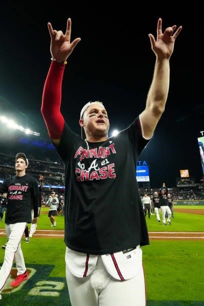 Joc Pederson of the Atlanta Braves celebrates after the Braves defeated the Milwaukee Brewers 5-4 in Game 4 of the NLDS between the Milwaukee Brewers...