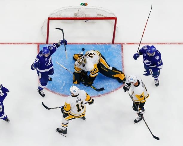 Anthony Cirelli of the Tampa Bay Lightning celebrates a goal against goalie Tristan Jarry of the Pittsburgh Penguins during the third period at...