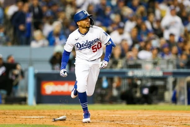 Mookie Betts of the Los Angeles Dodgers hits a two run home run in the fourth inning during Game 4 of the NLDS between the San Francisco Giants and...