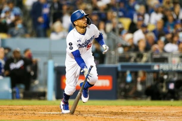 Mookie Betts of the Los Angeles Dodgers hits a two run home run in the fourth inning during Game 4 of the NLDS between the San Francisco Giants and...