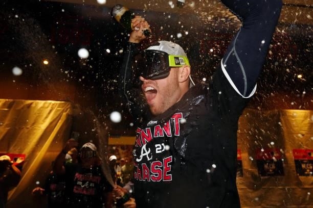 Freddie Freeman of the Atlanta Braves celebrates after the Braves defeated the Milwaukee Brewers in Game 4 of the NLDS at Truist Park on Tuesday,...