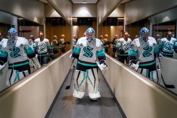 Goaltender Philipp Grubauer of the Seattle Kraken leads his team toward the ice for the pre-game warm up prior to NHL action against the Vegas Golden...